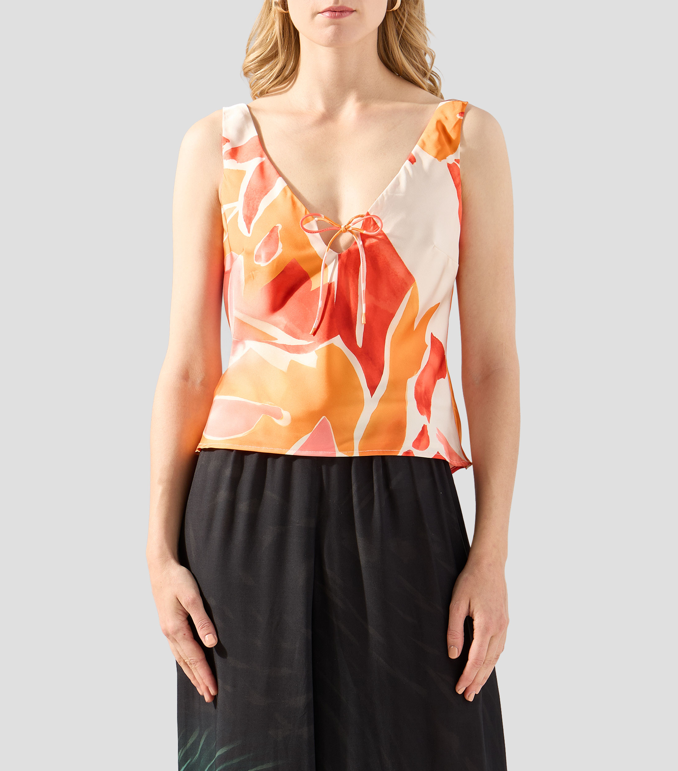 Blusa estampada sin mangas Mujer